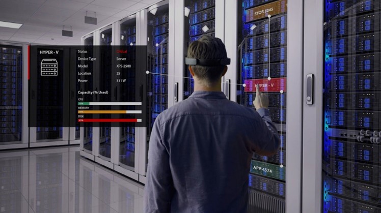 Figure 3 A data center operator wearing a small MARS headset in order to view the different components in a server