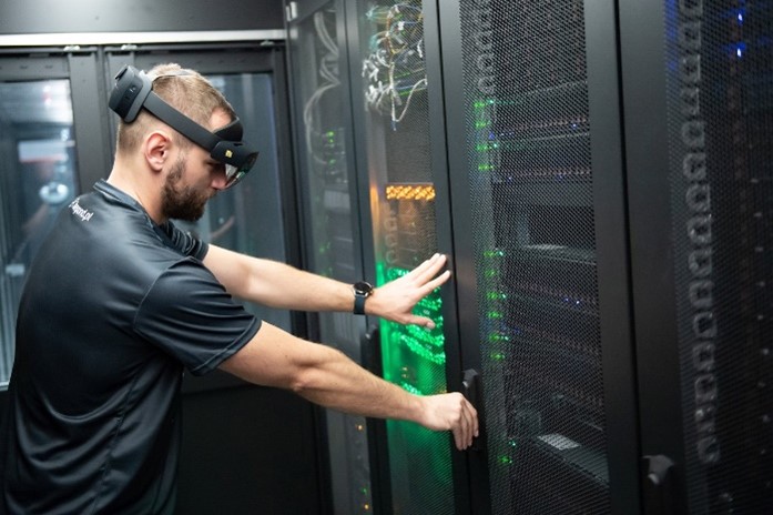 Figure 7 technician wearing the Microsoft HoloLens using Holoinventory.